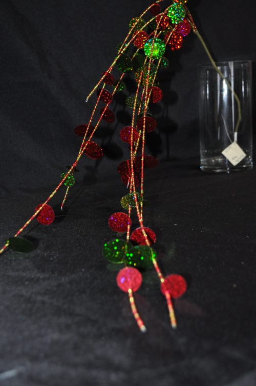 Banche décorative avec paillettes rouge et verte.